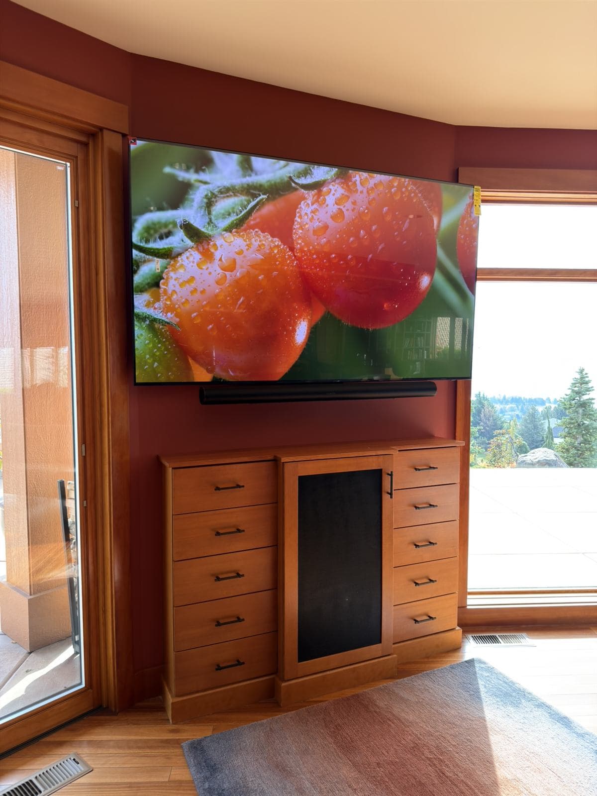 Living room TV and Sonos soundbar with hidden wiring