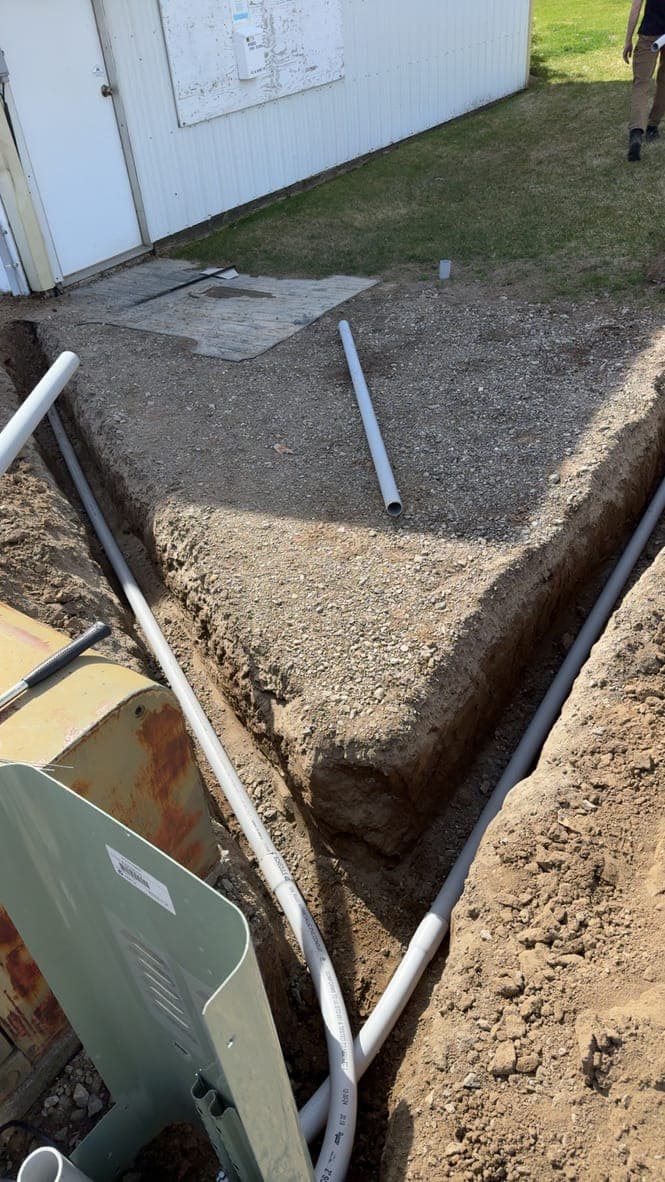Conduit run to a utility pedestal